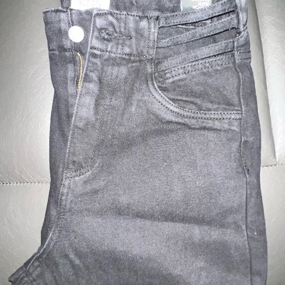 Black super high rise trendy jeans. Straight